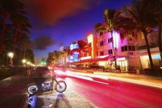 Miami Beach South Beach sunset in Ocean Drive Florida Art Deco and car lights