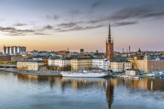 View of Riddarholmen from the Sodermalm island on sunset in Stockholm, Sweden, Europe