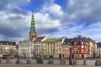 Street in Copenhagen downtown with view of St. Nicholas Church tower, Denmark, Europe