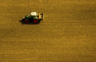 Tractor sowing in a field near Bochum Wattenscheid