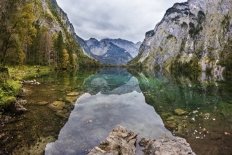 Unique lighting effects on the lake Obersee. Bavarian Alps. Berchtesgaden in Germany on the border