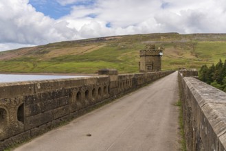 Near Middlesmoor, North Yorkshire, England, UK, May 19, 2019: The road over the dam of the Scar