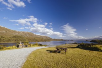 The picturesque landscape from Lake Pedder Wilderness Lodge over Lake Pedder on a hot summer's