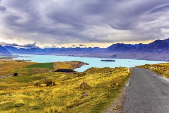 New Zealand, South Island. Lake Tekapo on cloudy day. The lake in the mountains. Travel to a