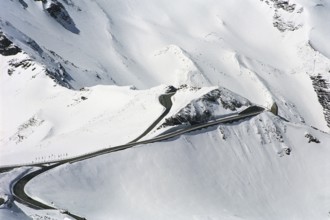 The famous Grossglockner mountain road leads throug snow-covered mountains. Hohe Tauern National