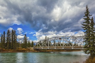 Road bridge over the picturesque river. Canadian Rocky Mountains, Jasper National Park