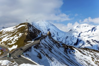 Austrian Alps. The snow on the mountainside began to melt. Dizzy turns of mountain serpentine.
