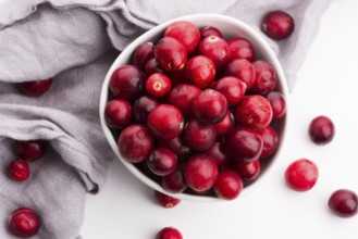 Ceramic bowl of Cranberry on white background