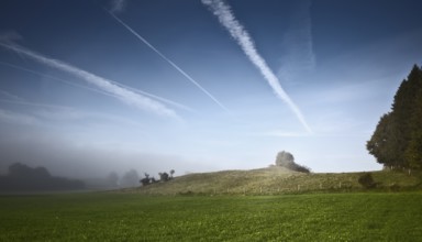 An image of a beautiful landscape with fog in bavaria germany