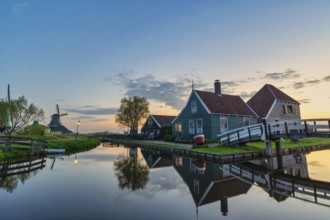 Amsterdam Netherlands, Sunrise landscape of Dutch Windmill and traditional house at Zaanse Schans