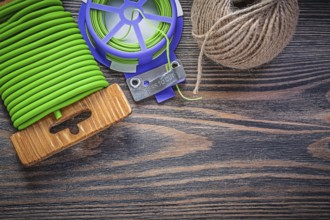 Soft twist tie hank of rope on wooden board agriculture concept