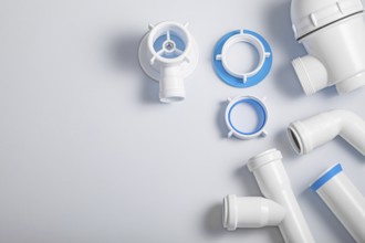 Plastic Sewer Pipes And Accessories On White Background