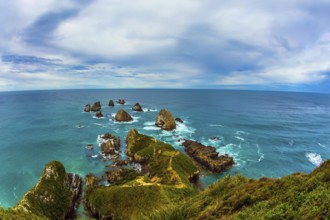 Nuggets Point is a landmark relief on the Otago coast, surrounded by rocky islets. Travel to New