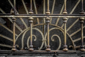 Decorations end 800 of an old Italian industrial railing