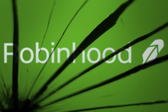 Dhaka, Bangladesh- 09 Nov 2024: Robinhood logo is visible on the broken glass