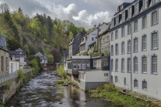 Picturesque houses along the Rur River in the historic center of Monschau, Germany, Europe
