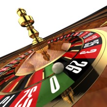 Roulette at the casino, as if photographed by a wide-angle, close-up on the ball, just about ready