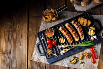 Delicious grilled sausage with various grilled vegetables