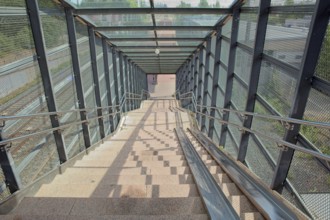 Stone stairs to railway platform on a summer day, Pitäjänmäki, Helsinki, Finland, Europe