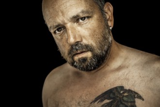 An image of a handsome man with a beard