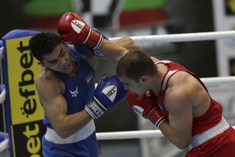 Sofia, Bulgaria. 27th February, 2021. Ruslan Kolesnikov (red) of Russia and Dilshodbek Ruzmetov of