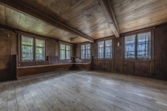 The living room with wooden corner bench in a house built around 1750 that has since been