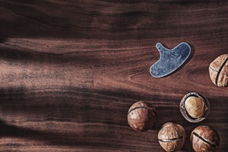 Nuts Of Macadamia On Vintage Wood With Copy Space