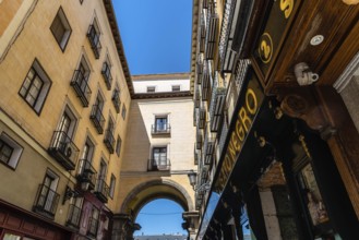 Madrid, Spain, June 1, 2019: Toledo Street near Plaza Mayor. Low angle view of old buildings,