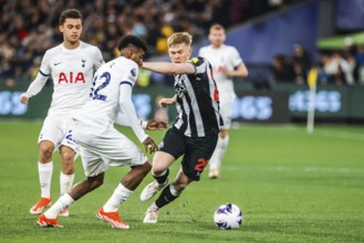 MELBOURNE, AUSTRALIA, MAY 22: Emerson Royal of Tottenham Hotspur and Lewis Hall of Newcastle United