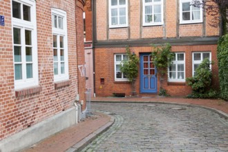 Narrow alley, Stade, Lower Saxony, Germany, Europe