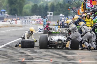 INDYCAR Series driver, RINUS VEEKAY (21) of Hoofddorp, Netherlands, brings his car in for service