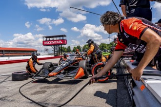 SANTINO FERRUCCI (14) of Woodbury, Connecticut comes down pit road for service during the Honda