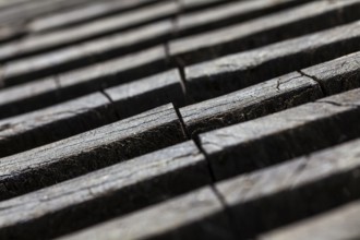 Detail of an old wooden gearwheel
