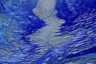 Abstract blue and white fresh paint mixed texture shapes
