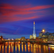 London skyline sunset on Thames river reflection at UK