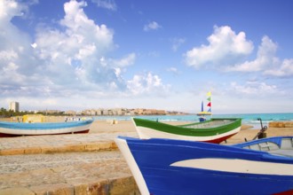 Beach of Salou with beached boats in Tarragona Catalonia Spain