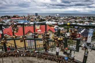 Love locks on a fence, viewpoint over Punta Arenas, Patagonia, Chile, South America