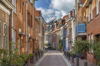 Street with historical houses in Haarlem city center, Netherlands