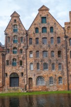 Historic buildings in Lübeck Warehouses at the harbour are a popular and famous sight made of red