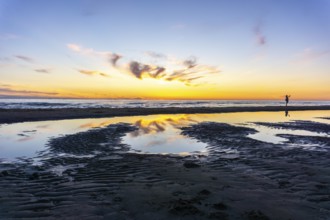 Beautiful sunset at the seaside at a beach in the Netherlands