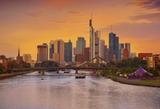 Frankfurt skyline at sunset in Germany with Meno river