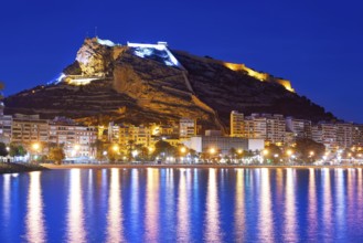 Alicante skyline at sunset from Postiguet beach in spain