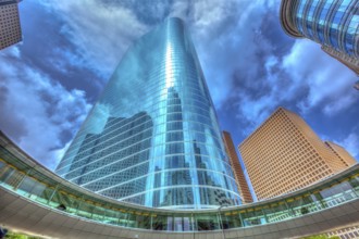 Houston downtown skyscrapers disctict with mirror blue sky reflection