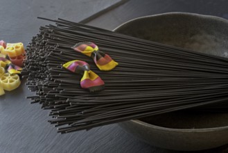 Black spaghetti and farfalle