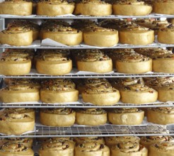 Chinese steamed buns with dried fruits and nuts on cooling racks