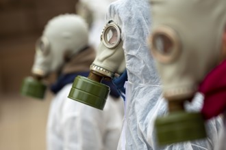 Environmentalists protest against Bulgaria's minks fur farms wearing gas masks
