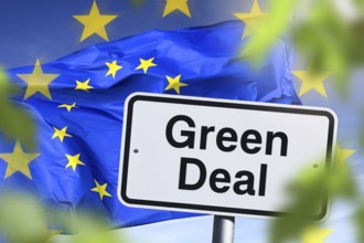 Sign with inscription Green Deal in front of EU flag, photomontage