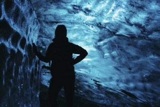 Human features on the background of ice cave in Iceland