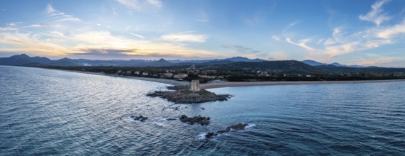 An aerial panorama landscape of the Torre di Barisardo beach on the east coast of Sardinia at dusk