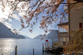 Some hotel on Lake Lugano on a sunny day while hiking the Oliver Trail in Lugano, fantastic autumn